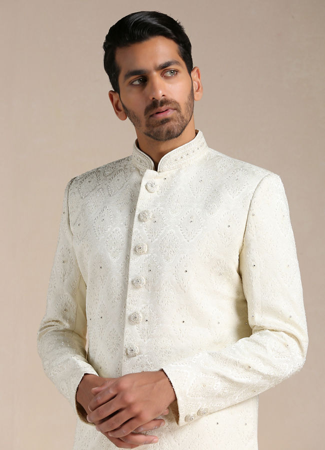 alt message - Manyavar Men Warm White Medallion Patterned Sherwani Set image number 0